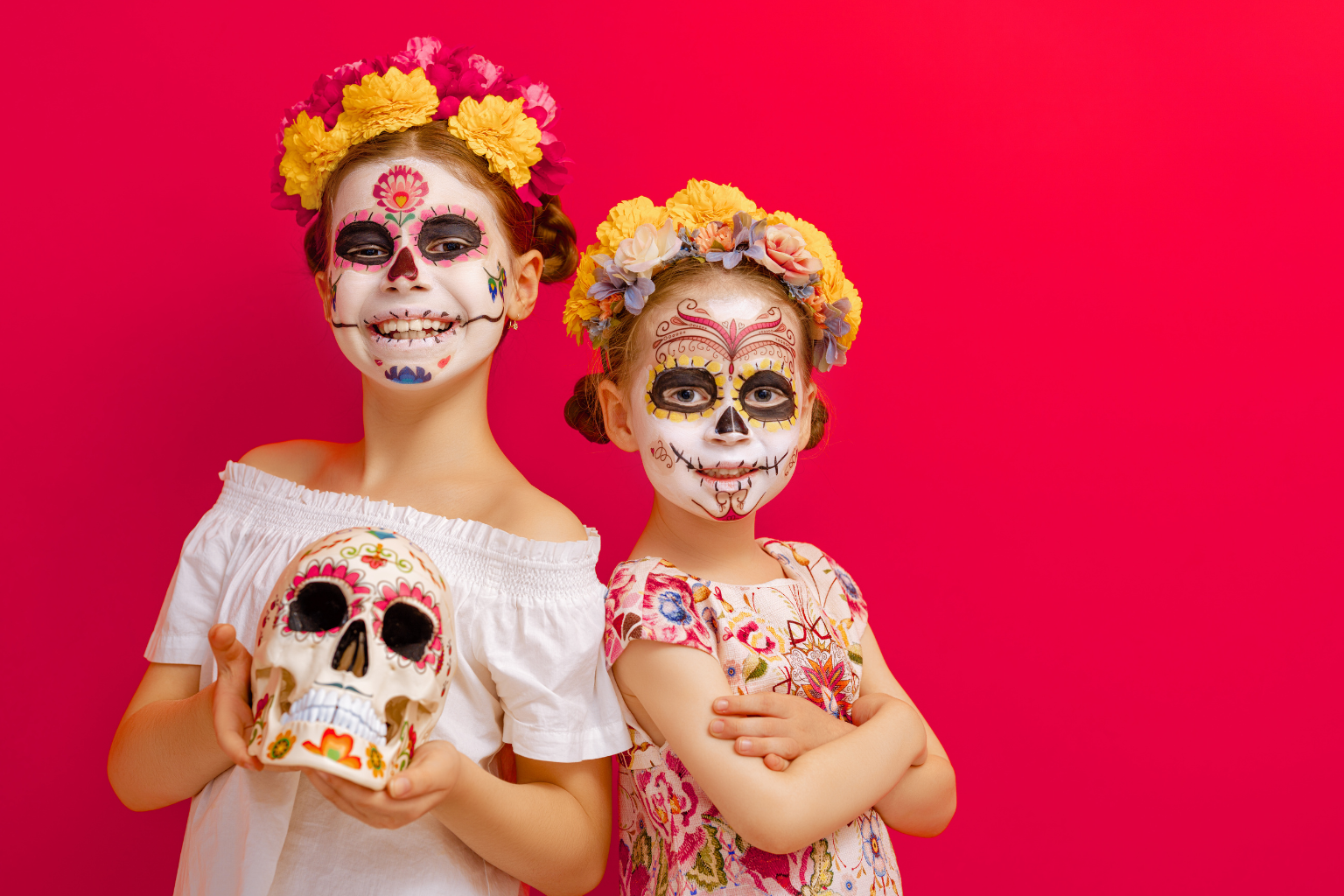marigold-lined street during Day of the Dead in Oaxaca, a family watching the celebration